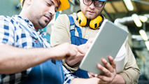 Health and Safety professionals looking at tablet software